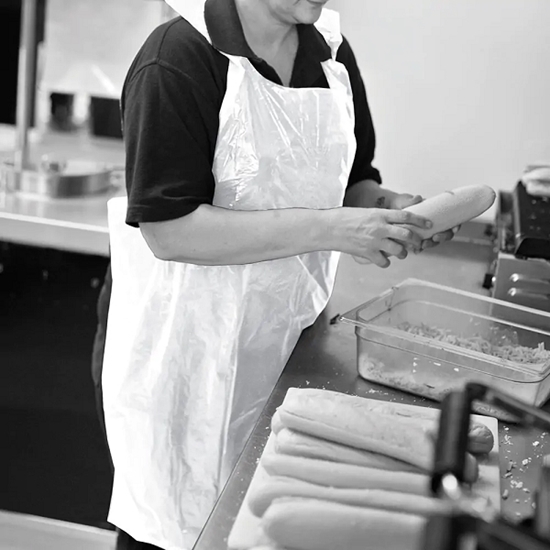 Picture of Shield Standard Length Disposable Aprons on a Roll 68CM x 107CM WHITE